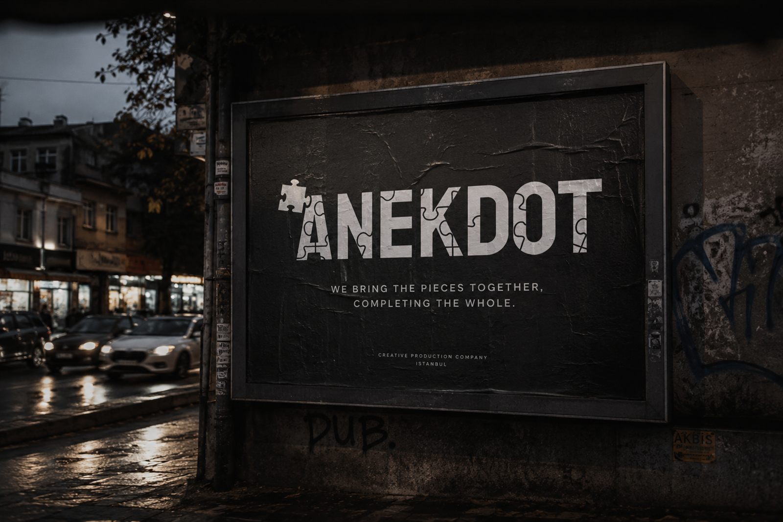 Anekdot billboard on an Istanbul street at dusk
